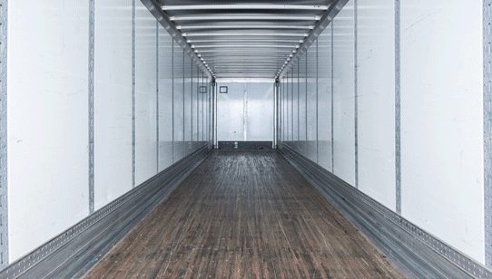 Rotating image of Semi trailer interior, industrial garage door and tool steel bars